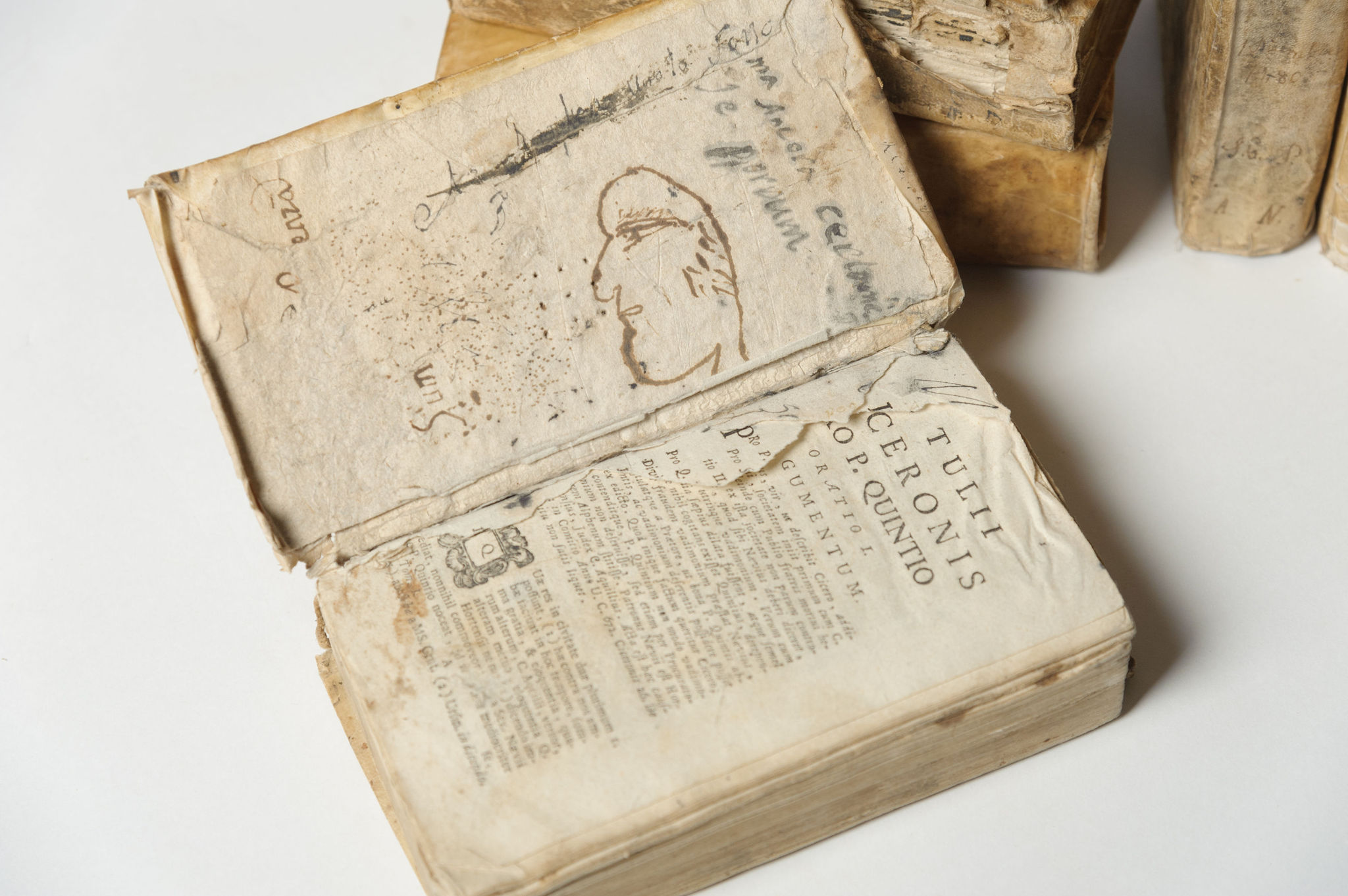 A collection of nine antique Vellum books Nikki Page Antiques